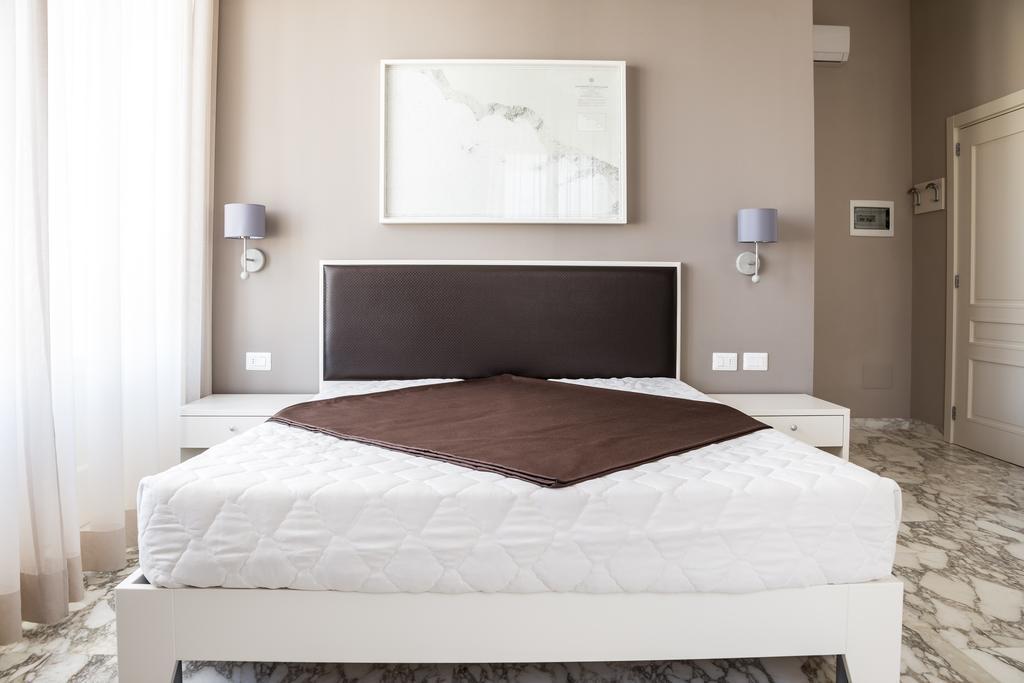 Faro Bianco - Suites&apartments Affittacamere 3*