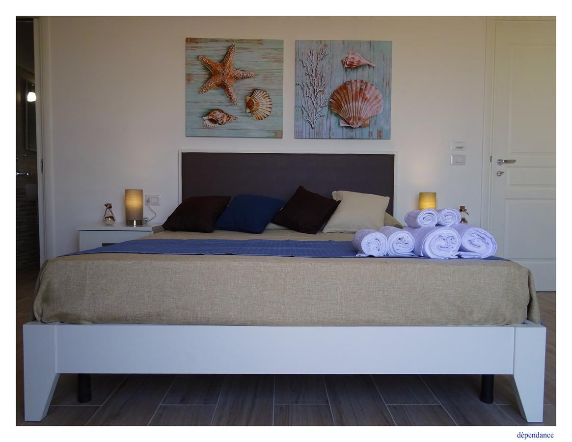 Faro Bianco - Suites&apartments Affittacamere