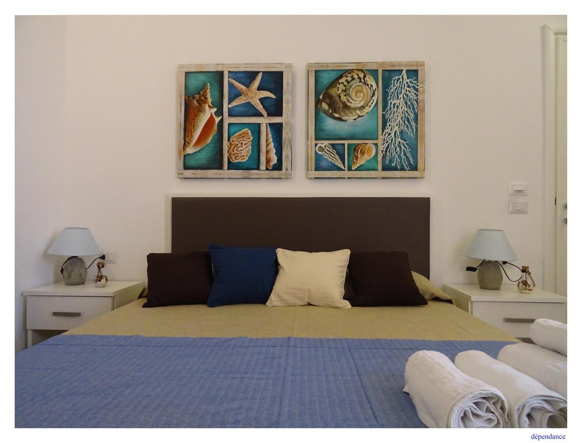 Faro Bianco - Suites&apartments Affittacamere